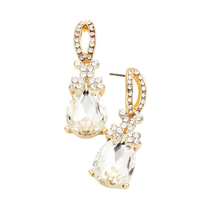 Gold Teardrop Crystal Rhinestone Evening Earrings, are the perfect accessory for any special occasion. Each earring features a teardrop-shaped crystal encrusted in rhinestones for a glamorous sparkle and shine. High-quality stones are set securely in the design. A timeless gift piece that will sparkle for years.