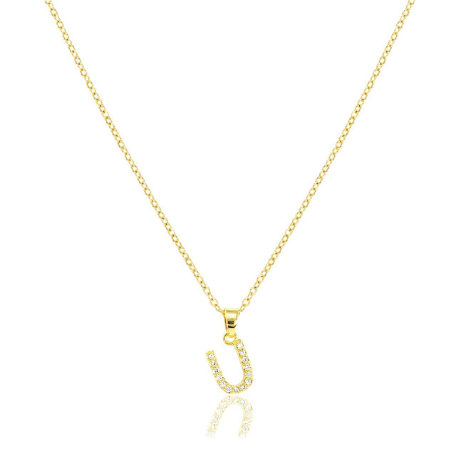 Gold U Stainless Steel CZ Stone Paved Monogram Pendant Necklace features a stunning and unique design. The high-quality stainless steel construction and CZ stone pave detailing ensures durability and add a touch of elegance. Perfect for accessorizing any outfit and making a personalized statement.
