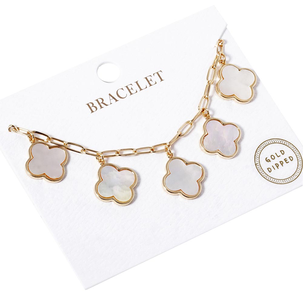 Gold White Gold Dipped Quatrefoil Charm Station Bracelet, is the perfect accessory for any occasion. Crafted from quality materials, it features an attractive quatrefoil charm station and a classic clasp for added security. The perfect blend of fashion and function. Excellent gift for the people you love on any occasion.