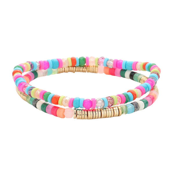 Gold Multi 2PCS - Heishi Beaded Stretch Multi Layered Bracelets, Upgrade your bracelet game with these. This set includes two bracelets that are made with high-quality Heishi beads and stretchy elastic for a comfortable fit. The layered design adds a stylish touch to any outfit. Perfect for adding a pop of color to your look.