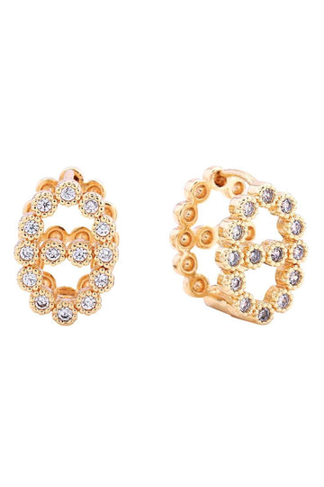 Gold Elevate your everyday look with these stunning 14K Bling Farandole Pave CZ Huggie Earrings. Crafted from hypoallergenic brass and adorned with sparkling cubic zirconia pavé detailing, these versatile huggie earrings deliver maximum shine in a compact 1.5cm diameter design. Perfect for sensitive ears, they're lead and nickel compliant for worry-free wear. Whether you're dressing up or keeping it casual, these brilliant beauties add instant glamour to any occasion.