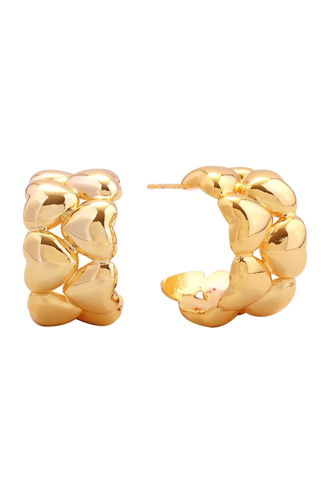 Gold Delicate brass post earrings with a charming bumpy heart design, dipped in 14K gold and white finishes. Each earring measures 1.9cm in diameter, offering a subtle yet eye-catching look. Hypoallergenic construction makes them perfect for sensitive ears. Lead and nickel compliant for safe, worry-free wear. An elegant addition to any jewelry collection.