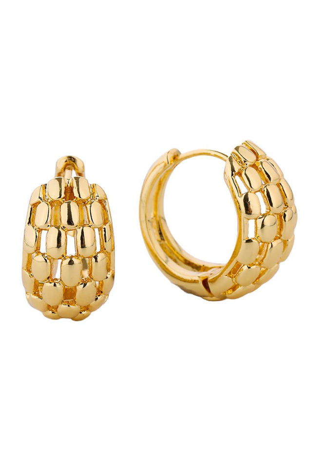 Gold Delicate 14K gold and white gold dipped huggie hoops crafted from hypoallergenic brass. These petite hoops feature a 2.11cm diameter, perfect for a subtle everyday look. Lead and nickel compliant for sensitive skin. Lightweight, versatile, and designed to hug the earlobe with effortless elegance.