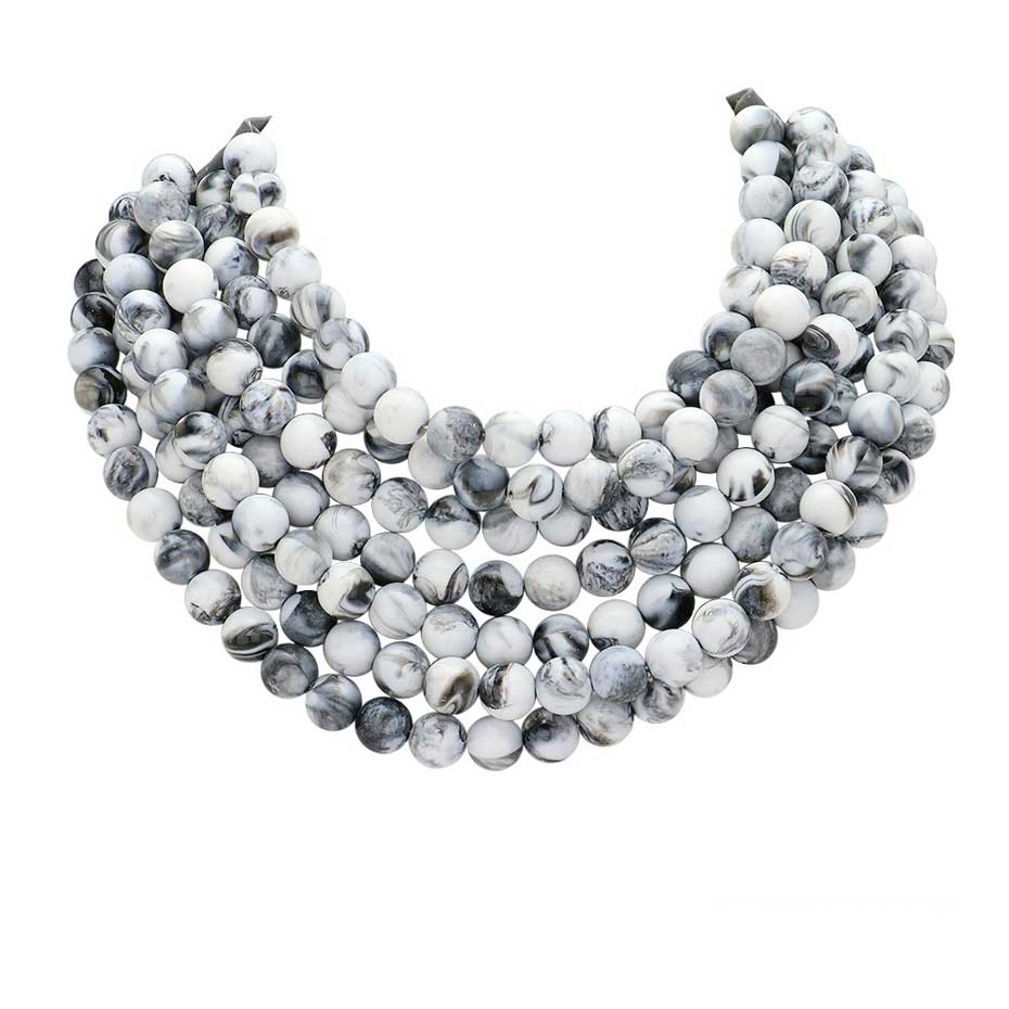 Gray Chunky Metal Ball Beaded Multi Layered Faux Leather Magnetic Necklace, Add a bold touch to your wardrobe with this necklace. Featuring multiple strands of soft faux leather adorned with chunky metal ball beads, this statement necklace effortlessly elevates any outfit. The magnetic clasp ensures easy wear.