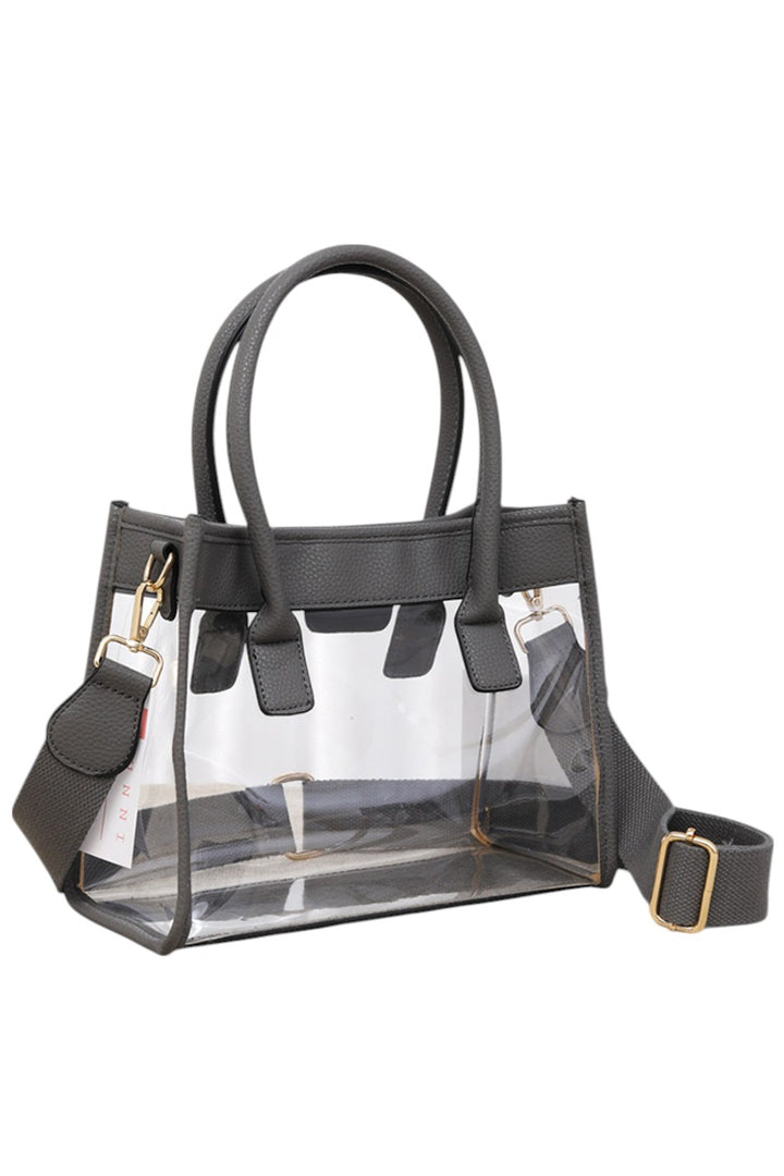 Color Trim Clear Hand Bag combines modern transparency with vibrant accents, offering a stylish yet practical accessory. Its clear design allows easy visibility of contents, while the colorful trim adds a fashionable touch. Lightweight and spacious, it’s ideal for daily use or events requiring quick access to essentials without sacrificing style. Durable materials ensure long-lasting wear, making it a smart choice for those who value both function and trend. 