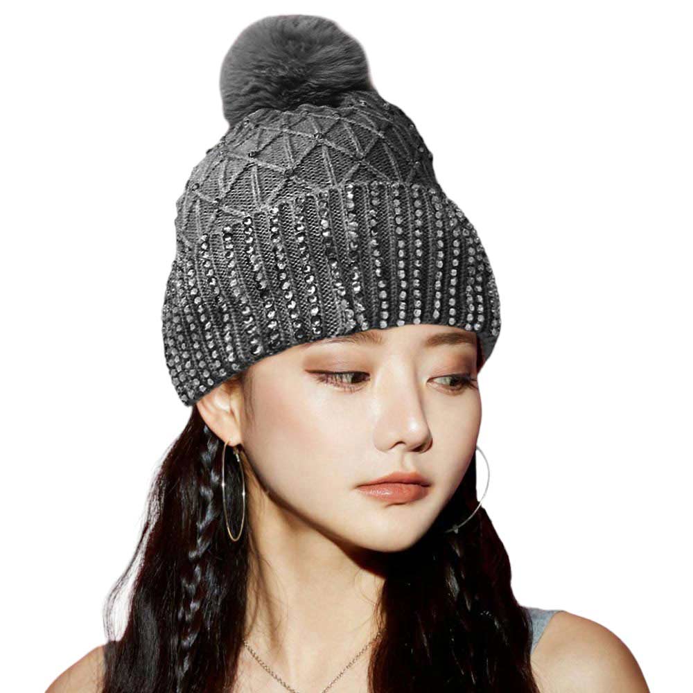 Gray Fleece Lining Rhinestone Embellished Pom Pom Beanie Hat. Stay warm and stylish with this. Made of a cozy knit blend and featuring a luxurious rhinestone embellishment, this hat provides a fashion-forward look while keeping you warm and comfortable. Perfect seasonal gift idea for fashion-loving close people!