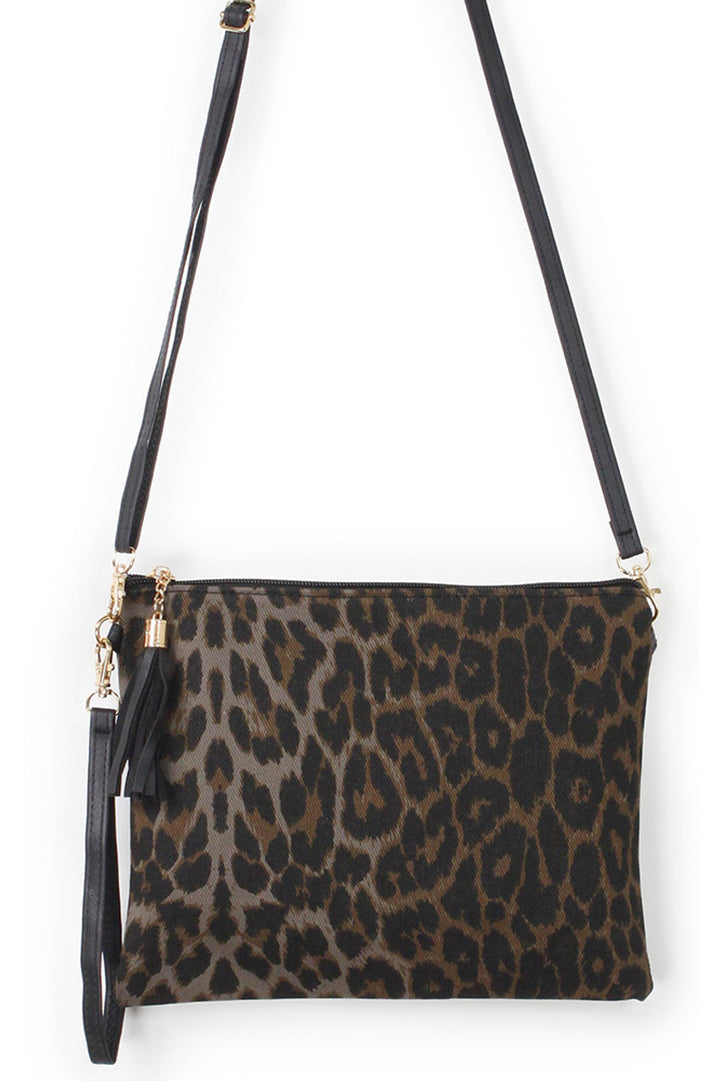 Leopard Print Crossbody Clutch Bag combines bold style with practical design. Featuring a distinctive leopard pattern, it adds a fashionable edge to any outfit. The crossbody strap offers hands-free convenience, while its compact size is perfect for carrying essentials securely. Crafted with attention to detail, this clutch balances durability and elegance, making it a smart choice for both casual and evening occasions. 