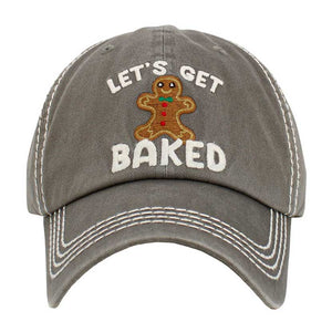 Gray Let's Get Baked Message Gingerbread Man Pointed Vintage Baseball Cap, Crafted with a curved visor and adjustable back closure, this baseball cap adds a pop of fun to any sporty or casual outfit. The stitched design features a delicious gingerbread man making it a nice gift choice for sports lovers on Christmas days.