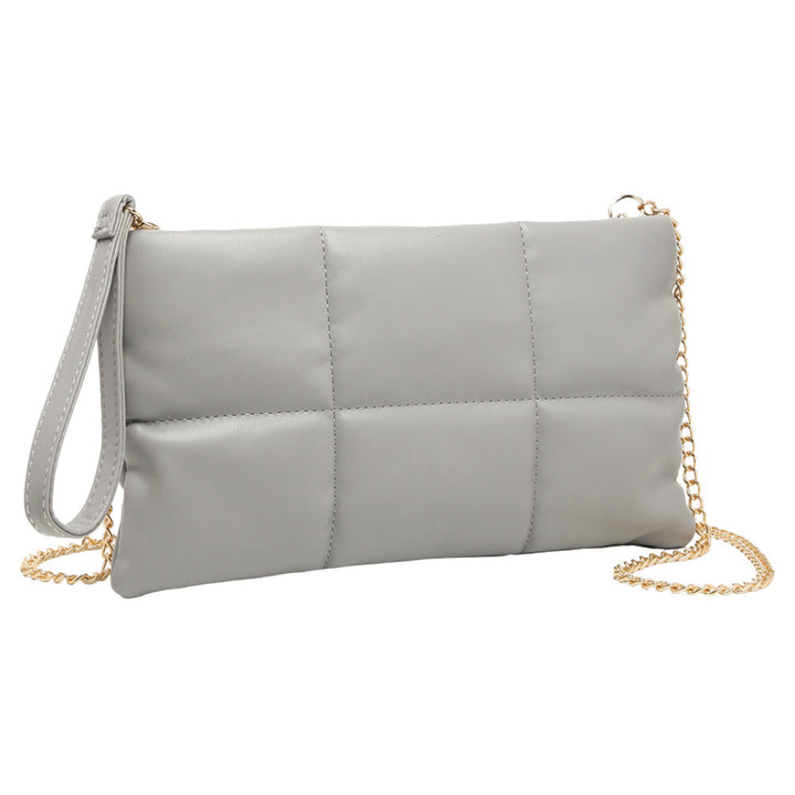 Gray Quilted Solid Faux Leather Crossbody Bag, Crafted with high-quality faux leather, this bag is both stylish and highly resistant to wear and tear. Its adjustable strap and sleek quilted pattern make it comfortable and fashionable. Wear it for any occasion. Nice gift item to family members and friends on any occasion.