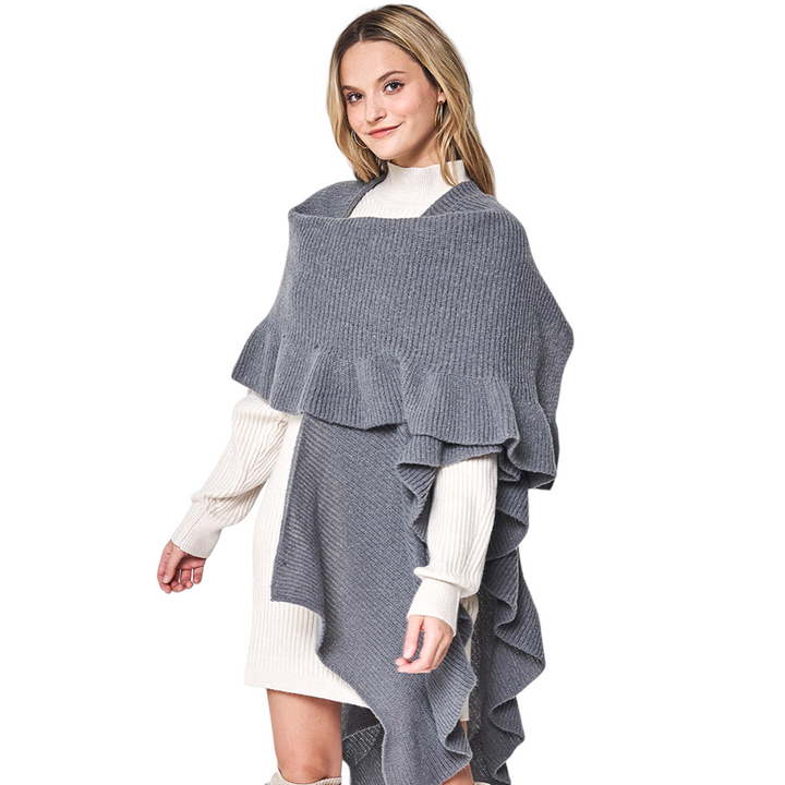 Gray Reversible Ruffle Sleeves Knit Ruana Poncho adds the perfect touch of sophistication to your look. Crafted from 100% Polyester this poncho features reversible sleeves with a unique ruffle design. Easy to wear and care for, it's a must-have for any wardrobe. Excellent choice as a gift item for your loved ones.