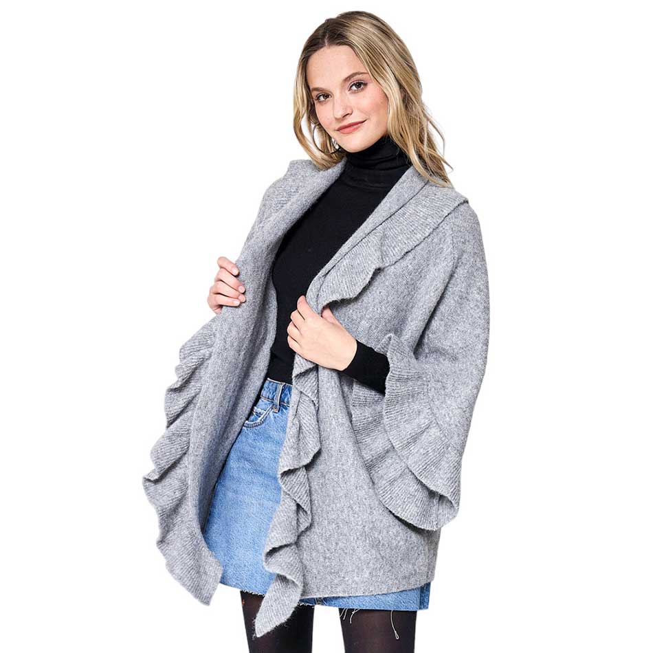 Gray Ruffle Knit Cardigan, Featuring a unique ruffle detailing and crafted from soft knit fabric, this cardigan offers both comfort and style. Perfect for layering with your winter wardrobe, you'll feel comfortable and fashionable in any situation. Ideal winter gift to fashion forwarded friends and family members.