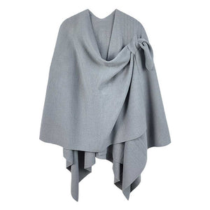 Gray Shoulder Strap Solid Ruana Poncho, with the latest trend in ladies outfit cover-up! the high-quality bling border solid neck poncho is soft, comfortable, and warm but lightweight. Stay protected from the chilly weather while taking your elegant looks to a whole new level with an eye-catching, luxurious outfit women! 
