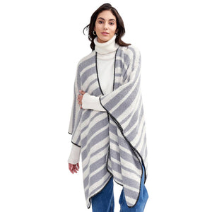 Gray Striped Cozy Two-Tone Knit Kimono Poncho, is crafted from a soft blend of quality materials for a comfortable, stylish look. The two-tone knit pattern ensures a unique, eye-catching piece. A thoughtful gift for fashion-loving friends and family members, special ones, colleagues, or Secret Santa gift exchange in winter.