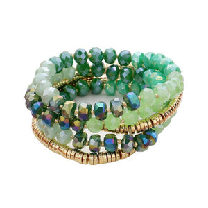 Green 5PCs Faceted & Heishi Beaded Multi Layered Stretch Bracelet, is crafted with a combination of faceted and heishi beads for a unique look. The stretchable design fits most wrists, making it perfect for special occasion. The multi-layered design adds a stunning look that will be sure to turn heads.