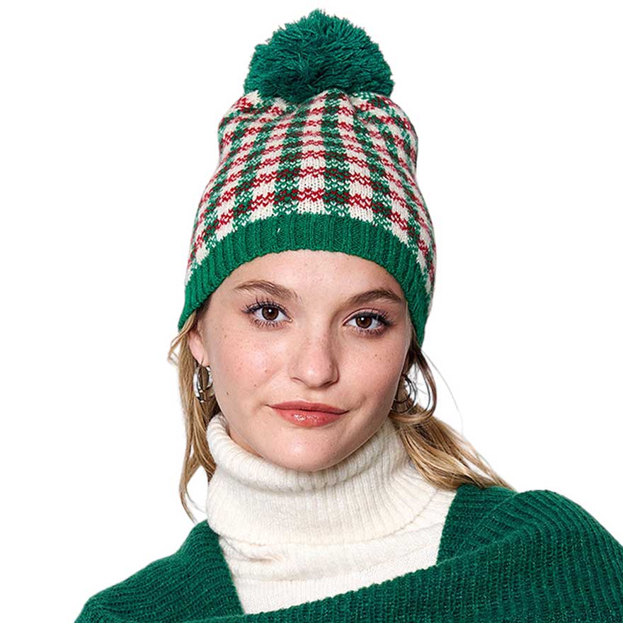 Green Check Patterned Pom Pom Beanie Hat. This knitted beanie features a classic check pattern in multiple color options and a luxurious pom pom. It’s perfect for any cold weather activity and adds a colorful touch to any outfit. Ideal for gifting to your friends and family members or to treat yourself on chilly days.