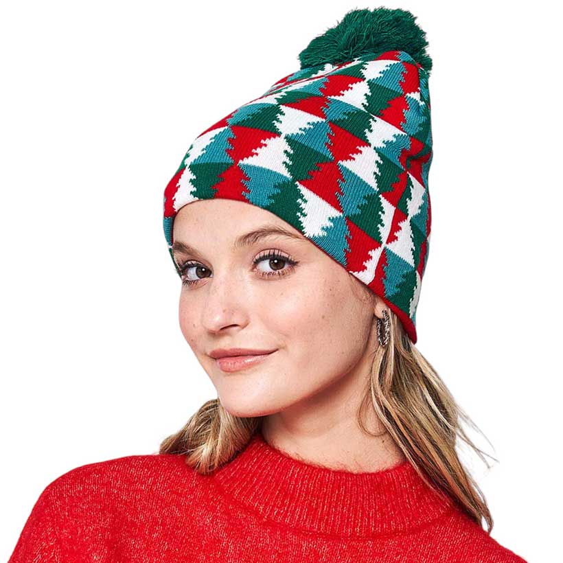 Green Christmas Tree Patterned Pom Pom Beanie Hat, is the perfect combination of winter fashion and festive cheer. Featuring a classic design, this unique hat is made with superior quality materials to ensure warmth and comfort.  It is an ideal choice for gifting to your beloved ones in this Christmas season.