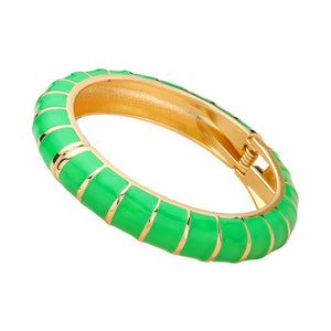 Green Enamel Bamboo Hinged Bangle Bracelet, Discover the beauty and elegance of our bracelets that combine the durability of bamboo with the vibrant pop of enamel. Made for everyday wear, the bangle is both stylish and practical, with a hinged design for easy on and off. Add a touch of sophistication to your wardrobe.