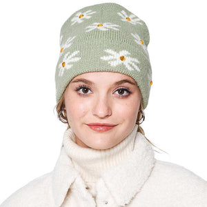 Green Gem Flower Beanie Hat, Stay warm and fashionable with this. This knitted beanie features an intricate flower design with gems embedded in each petal, adding a glamorous sparkle to any outfit. The classic ribbed-knit construction ensures a snug fit for the perfect cold-weather accessory.