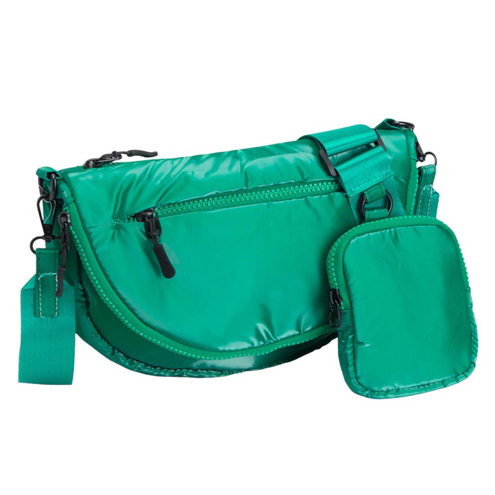 Green Glossy Puffer Half Moon Crossbody Bag, the lightweight, stylish design features a durable water-resistant nylon that is perfect for outdoor activities. The adjustable shoulder strap makes it easy to sling across your body for hands-free convenience. Carry your essentials in style and comfort with this fashionable bag.