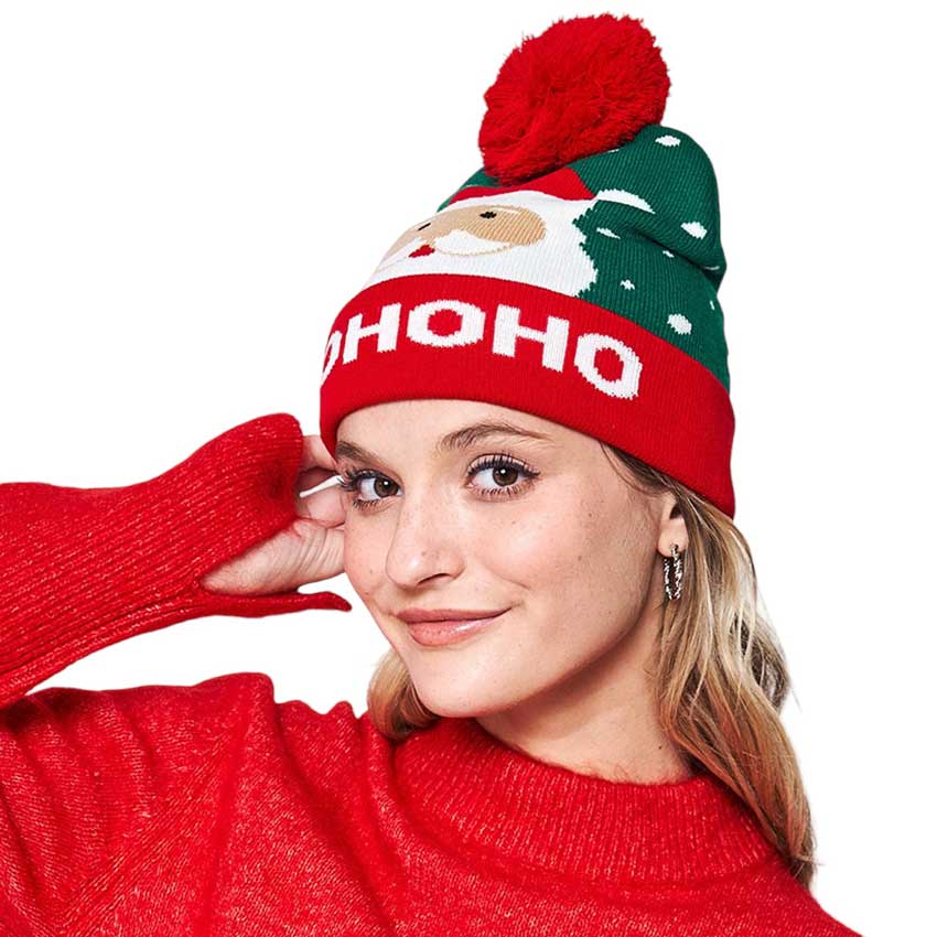 Green HoHoHo Message Santa Claus Pom Pom Beanie Hat, adds a festive touch to your winter wardrobe. It features a knitted design classic white and red design with a 'Ho Ho Ho' message to complete the Santa vibe. The pom pom detail at the top further adds to the charm of this stylish piece. Nice gift choice on cool Christmas days.