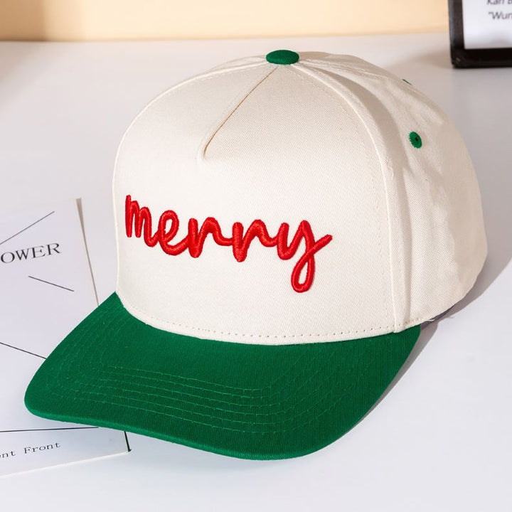 Add cheerful holiday spirit to your look with the Merry baseball cap, designed with bold embroidered lettering and a festive vibe. Perfect for casual wear, seasonal parties, or gifting, this cap makes a fun statement and spreads joy all season long.