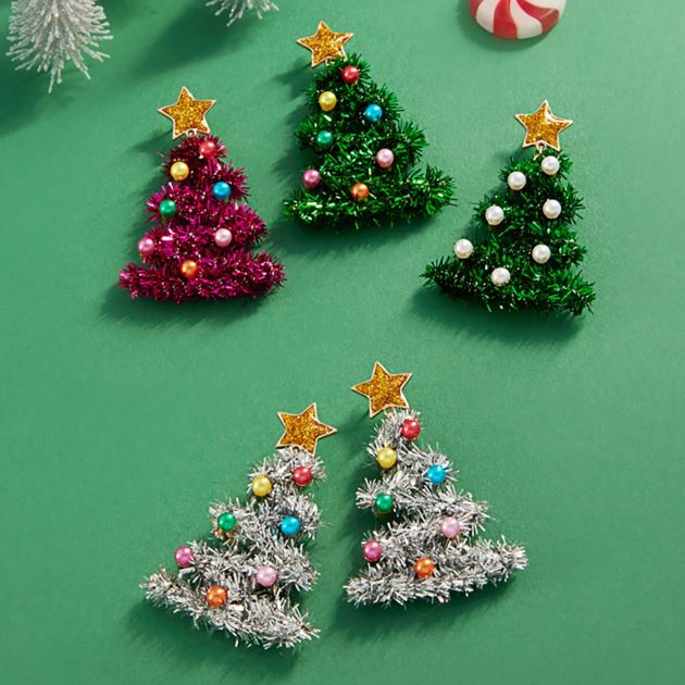 Show your holiday spirit with these bold Christmas tree statement earrings, featuring tinsel detailing, colorful ornaments, and a sparkling star topper. Ideal for festive parties and seasonal outfits, these earrings bring cheer and a touch of whimsy to any celebration.