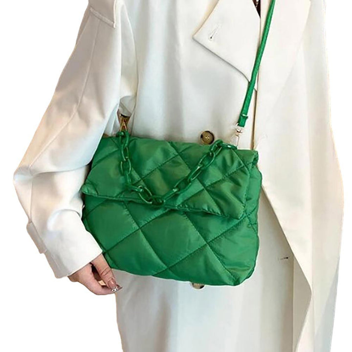 Green Quilted Padded Flap Shoulder Bag Crossbody Bag, this bag is expertly crafted for both style and functionality. With its padded design and quilted detailing, this bag offers both a stylish and comfortable way to carry your essentials. The flap closure adds an extra layer of security, perfect for daily or occasional use.