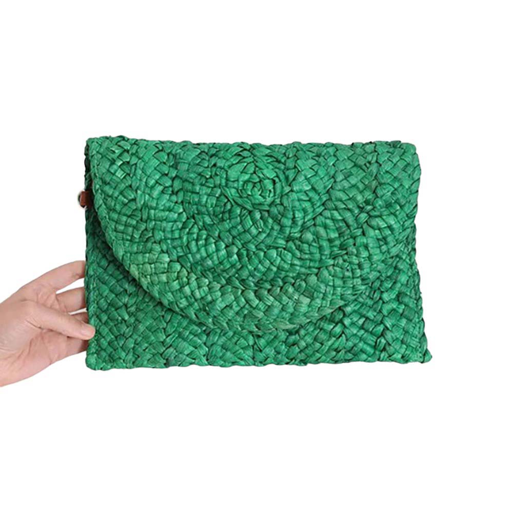 Green Rattan Braided Clutch Bag, This vintage-inspired bag is handmade and eco-friendly. The intricate braided design adds a touch of bohemian style to your outfit. Made from sustainable materials, this bag is not only stylish but also environmentally conscious. Upgrade your accessory game with this unique clutch bag.