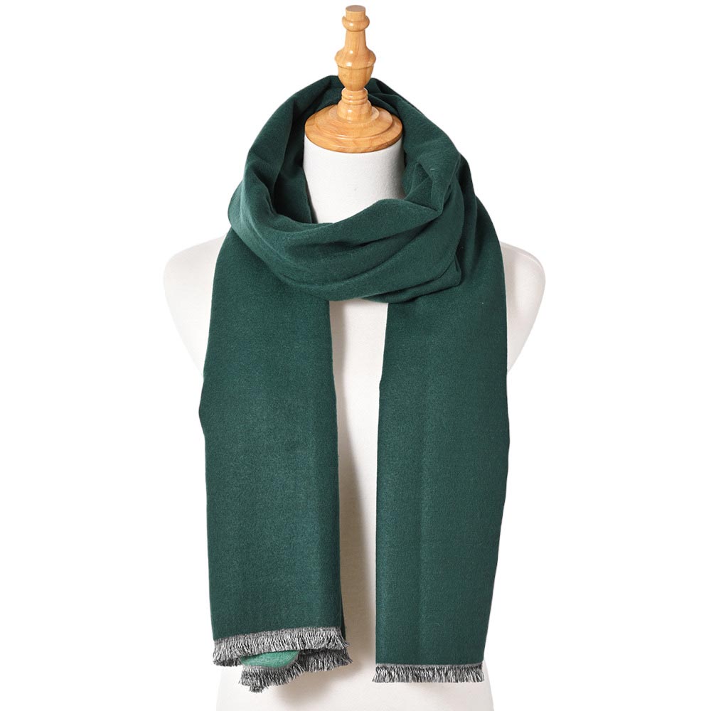 Green Reversible Frayed Oblong Scarf, Wrap yourself in style and warmth with this beautiful scarf. Crafted with sumptuous, lightweight fabric, this versatile scarf can be worn in two ways. A perfect winter accessory for wardrobe staples makes it perfect for gifting as a winter gift to any close person or treating yourself.