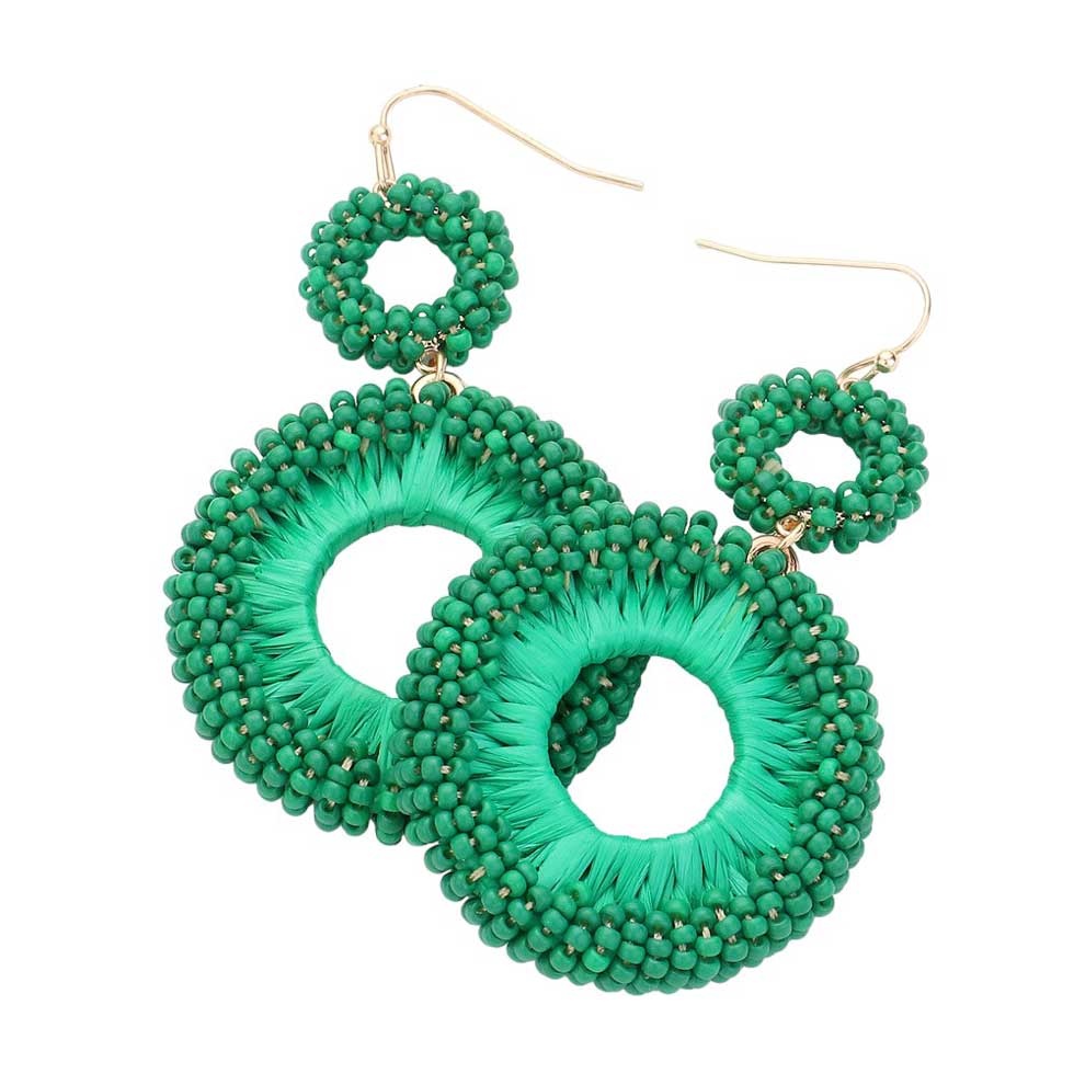 Green Seed Beaded Raffia Wrapped Open O Link Dangle Earrings, Discover the perfect blend of style and sustainability with these. Crafted with natural raffia and intricately beaded, these earrings add a touch of bohemian chic to any outfit. Plus, with an open O link design, they're lightweight and comfortable to wear all day.