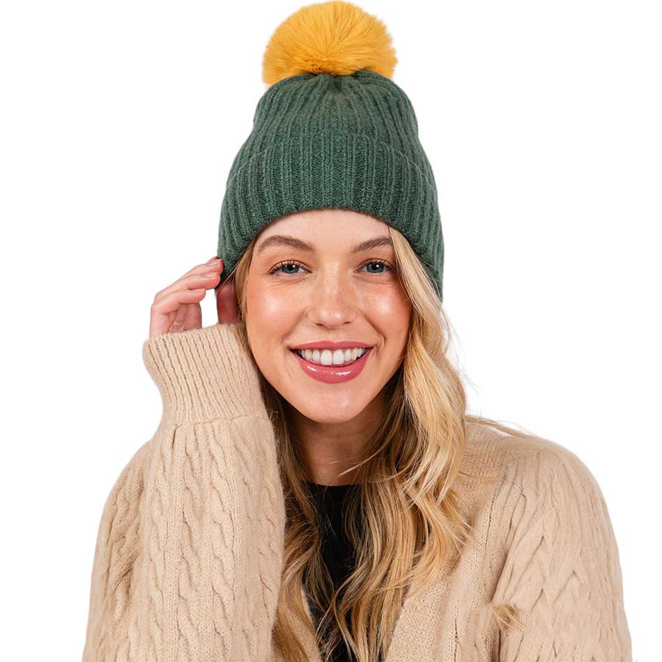 Green-Solid Color Pom Pom Two Tone Beanie Hat, Made from high-quality materials, this hat features a soft and cozy pom pom detail and a two-tone design. Perfect for any cold weather outfit,this hat is a must-have for your winter wardrobe.Ideal for travelers who are on vacation or just spending some time in the great outdoors