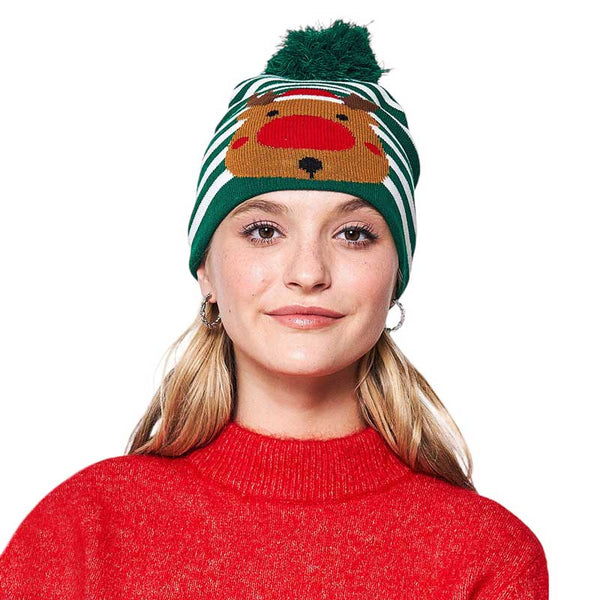 Green Striped Rudolph Pom Pom Beanie Hat, will keep you warm and cozy during winter months. Featuring a classic striped design, this hat also comes with an added pom pom detail, making it a great fashion accessory. Perfect for gifting to friends and family, it's a stylish and practical choice in the chilly Christmas Days. 