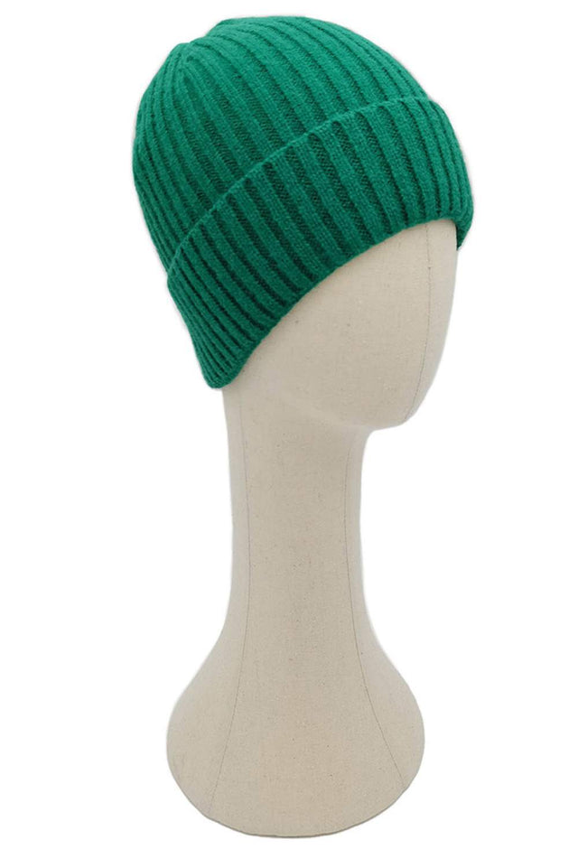 Green The Solid Color Ribbed Knit Cuff Beanie features a sleek, minimalist design with a ribbed texture and fold-over cuff for a classic winter look. Made from soft, stretchy knit fabric, it provides cozy warmth and a snug, comfortable fit for everyday wear.
