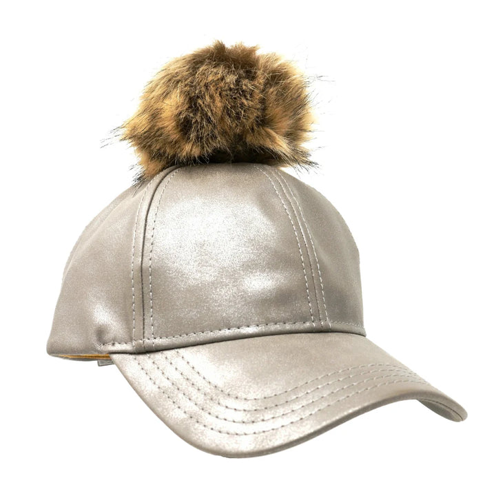 Grey Metallic Fur Pom CC Ball Cap combines a stylish metallic sheen with a soft fur pom for a distinctive look. Designed with expert craftsmanship, this cap ensures a comfortable fit and lasting quality, making it a versatile accessory that enhances both casual and chic ensembles. 