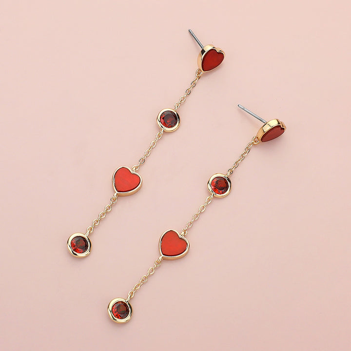 Heart Stone Bezel Link Dropdown Dangle Earrings are expertly crafted with a heart-shaped stone and a link design, creating a beautiful and sophisticated look. The dangle feature adds a touch of movement and elegance. Perfect for any occasion, these earrings are a must-have for any jewelry collection. 