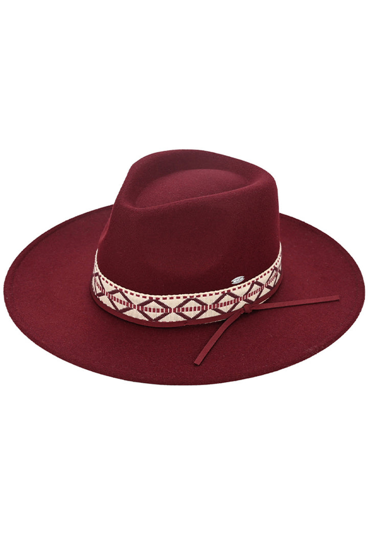 HeatherBurgundy C.C. Vegan Felt Panama Hat is designed with a stylish geometric trim band that adds a modern touch to any outfit. Made with high-quality vegan felt, this hat is both sustainable and fashionable. Perfect for adding a chic touch to your wardrobe.