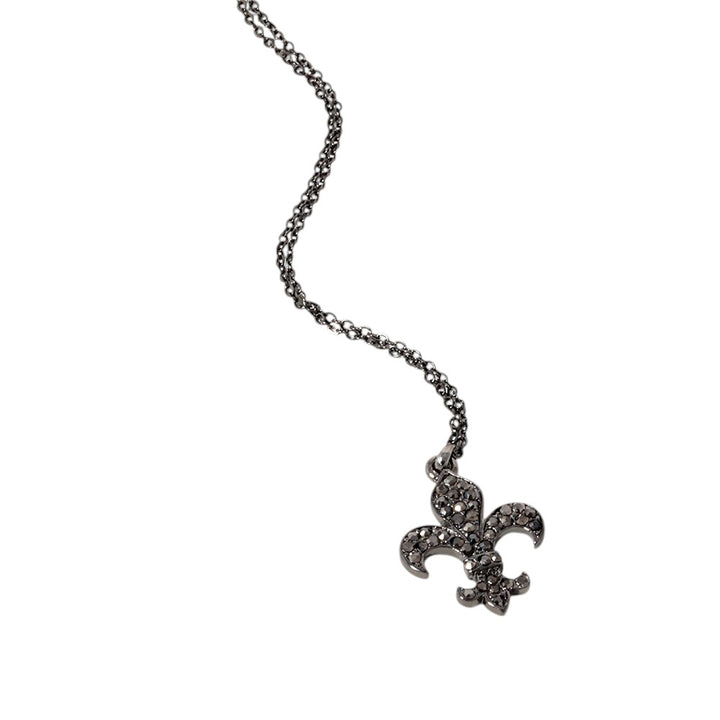 Hematite-Stone Paved Fleur de Lis Pendant Necklace are expertly crafted with a unique design and paved with high-quality stones for a stunning effect. This necklace is perfect for adding a touch of elegance and sophistication to any outfit. Enhance your style with this beautiful pendant necklace today. 