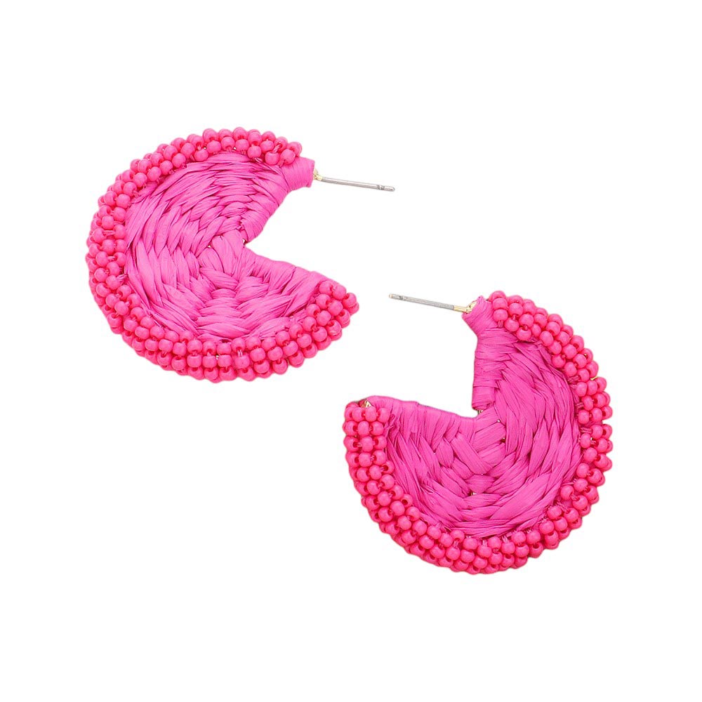 Hot Pink Raffia Wrapped Seed Beaded Round Earrings, Expertly crafted with a combination of raffia and seed beads, these round earrings add a touch of natural elegance to any outfit. The intricate beadwork and unique wrapping technique showcase expert artistry. Elevate your style with these earrings, perfect for any occasion.