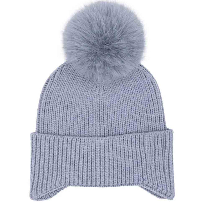 Ice Blue KIDS Ear Flap Pom C.C Beanie combines functional design with comfort to protect children from cold weather. Featuring extended ear flaps for added warmth and a soft pom-pom detail, this beanie is crafted from high-quality materials that provide insulation without sacrificing breathability. Its secure fit ensures it stays in place during active play, making it a reliable accessory for winter outings. 