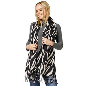 Ivory Animal Print Fringe Soft Scarf, delicate, warm, on-trend & fabulous, a luxe addition to any cold-weather ensemble. This scarf combines great fall style with comfort and warmth. It's a perfect weight and can be worn to complement your outfit or with your favorite fall jacket. Perfect gift for any occasion.