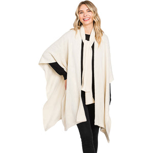 Ivory Attached Scarf Solid Cape Poncho With Neckline Tie, with the latest trend in ladies' outfit cover-up! the high-quality knit cape poncho is soft, comfortable, and warm but lightweight. It's perfect for your daily, casual, evening, vacation, and other special events outfits. A fantastic gift for your friends or family.