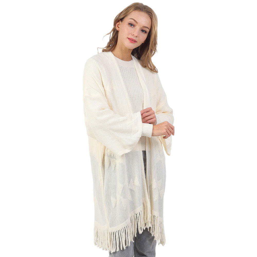 Ivory Aztec Patterned Fringe Poncho, with the latest trend in ladies' outfit cover-up! the high-quality knit fringe poncho is soft, comfortable, and warm but lightweight. This tassel poncho is perfect for your daily, casual, evening, vacation, and other special events outfits. A fantastic gift for your friends or family.