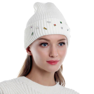 Ivory Bling Stone Embellished Knit Beanie Hat, wear this beautiful beanie hat with any ensemble for the perfect finish before running out the door into the cool air. The hat is made in a unique style and it's richly warm and comfortable for winter and cold days. Perfect gift item for all occasions.
