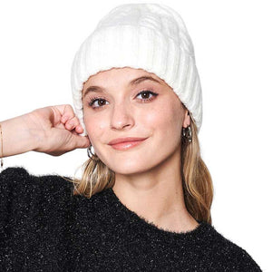 Ivory Solid Cable Knit Beanie Hat, Stay warm in style. Crafted with a soft, 100% acrylic fabric, this hat is perfect for cold weather days. The knit design ensures maximum comfort and breathability, while providing great protection from the cold. Enjoy this stylish and functional winter accessory. Ideal winter gift idea.