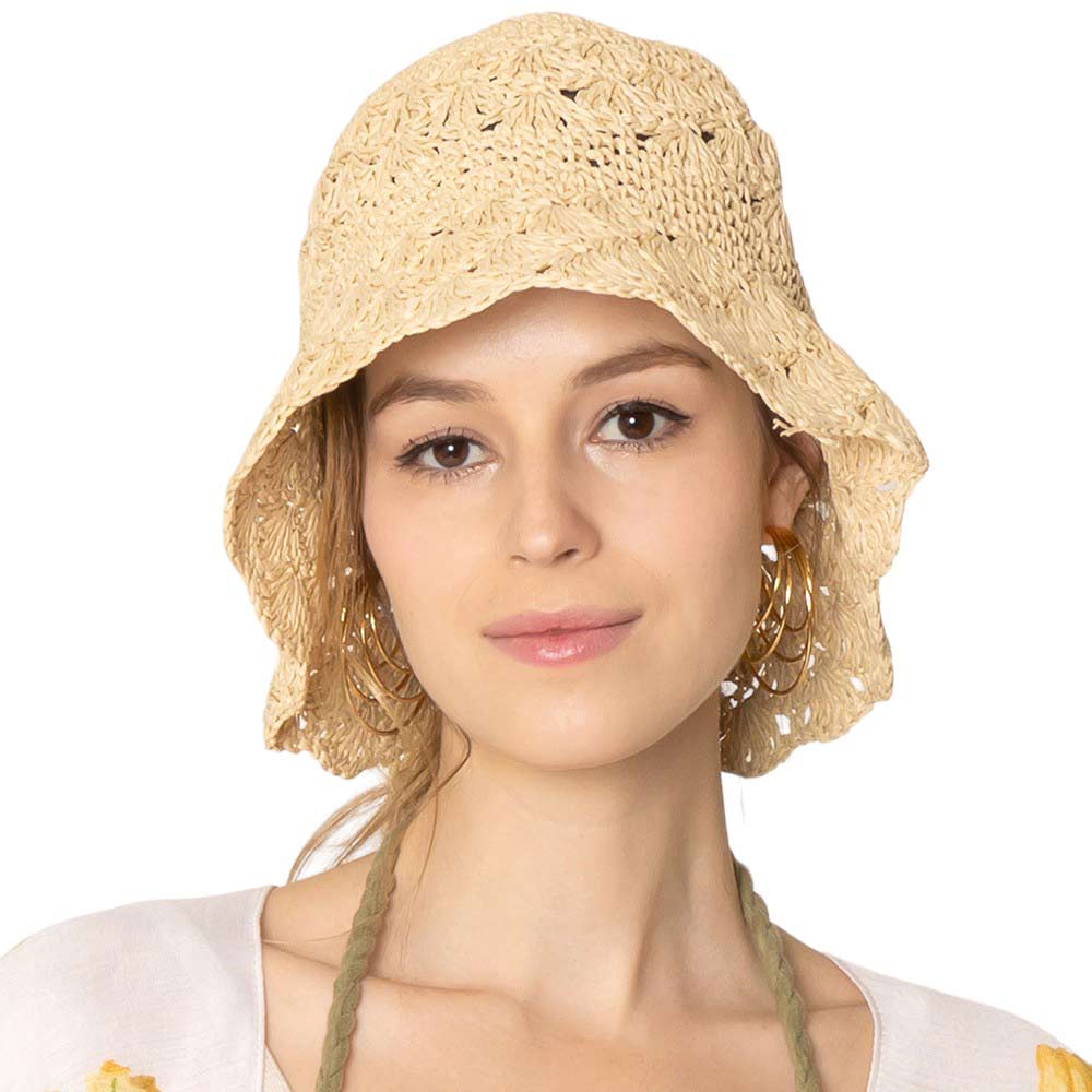 Ivory Crochet Straw Bucket Hat, Stay cool with our stylish summer hat! Made with lightweight, breathable materials, this hat is perfect for sunny days. Plus, the intricate crochet design adds a touch of charm to any outfit. Keep the sun out of your eyes while looking stylish - what's not to love? Grab yours today!