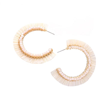Ivory Cube Bead Embellished Raffia Hoop Earrings, turn your ears into a chic fashion statement with these raffia hoop earrings! The beautifully crafted design adds a gorgeous glow to any outfit. Put on a pop of color to complete your ensemble in perfect style.