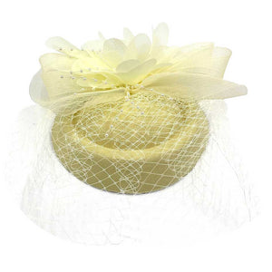 Ivory Floral Pearl Mesh Fascinator Headband, the perfect accessory for special or casual occasions. Crafted from supple mesh and finished with lush faux pearls, this Fascinator Headband elevates any look. A timeless and elegant piece, sure to be a favorite. A perfect gift on any occasion to your family members or a close one