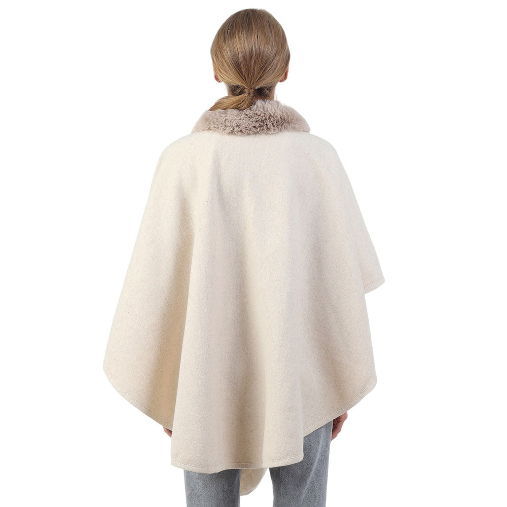 Ivory Faux Fur Collar Pom Pom Poncho, with the latest trend in ladies' outfit cover-up! The high-quality knit poncho is soft, comfortable, and warm but lightweight. It's perfect for your daily, casual, party, evening, vacation, and other special events outfits. A fantastic gift for your friends or family.