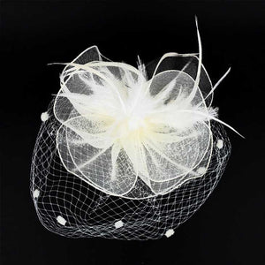 Ivory Feather Mesh Flower Fascinator Headband, will take your outfit to the next level. Crafted with intricate mesh flowers, this accessory is perfect for adding a touch of elegance to your look. The feather detailing provides a unique texture, making it a piece of statement. Perfect for any occasion or as an exquisite gift.