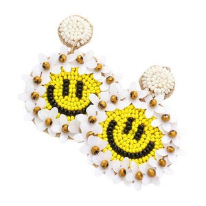 Ivory Felt Back Floral Seed Beaded Smile Dangle Earrings add a unique touch to any outfit. Made with delicate seed beads, the floral design and charming smile dangles will surely make a statement. With a comfortable felt backing, these earrings are both stylish and comfortable to wear.